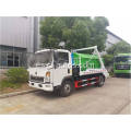 Sinotruk howo 5cbm camión de basura del brazo oscilante